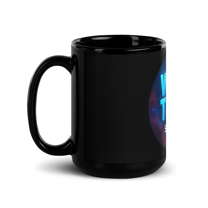 Black glossy 15 oz What Then Studio mug with partial sci-fi logo, handle on left