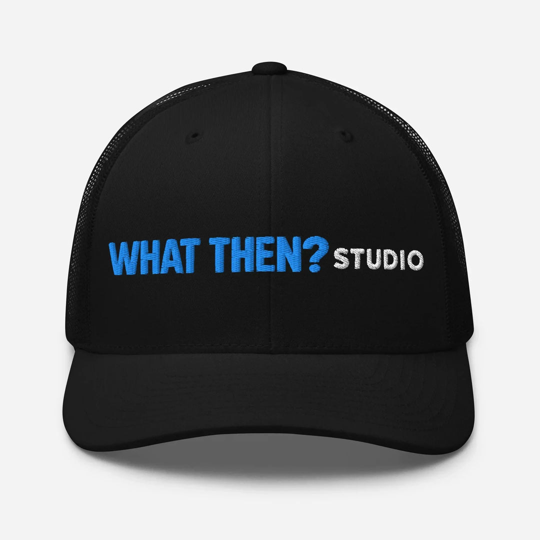 Black retro trucker hat with 'WHAT THEN? STUDIO' embroidered in blue and white text on front