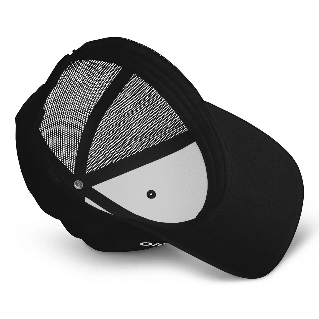 Inside view of black retro trucker hat with mesh back from What Then Studio