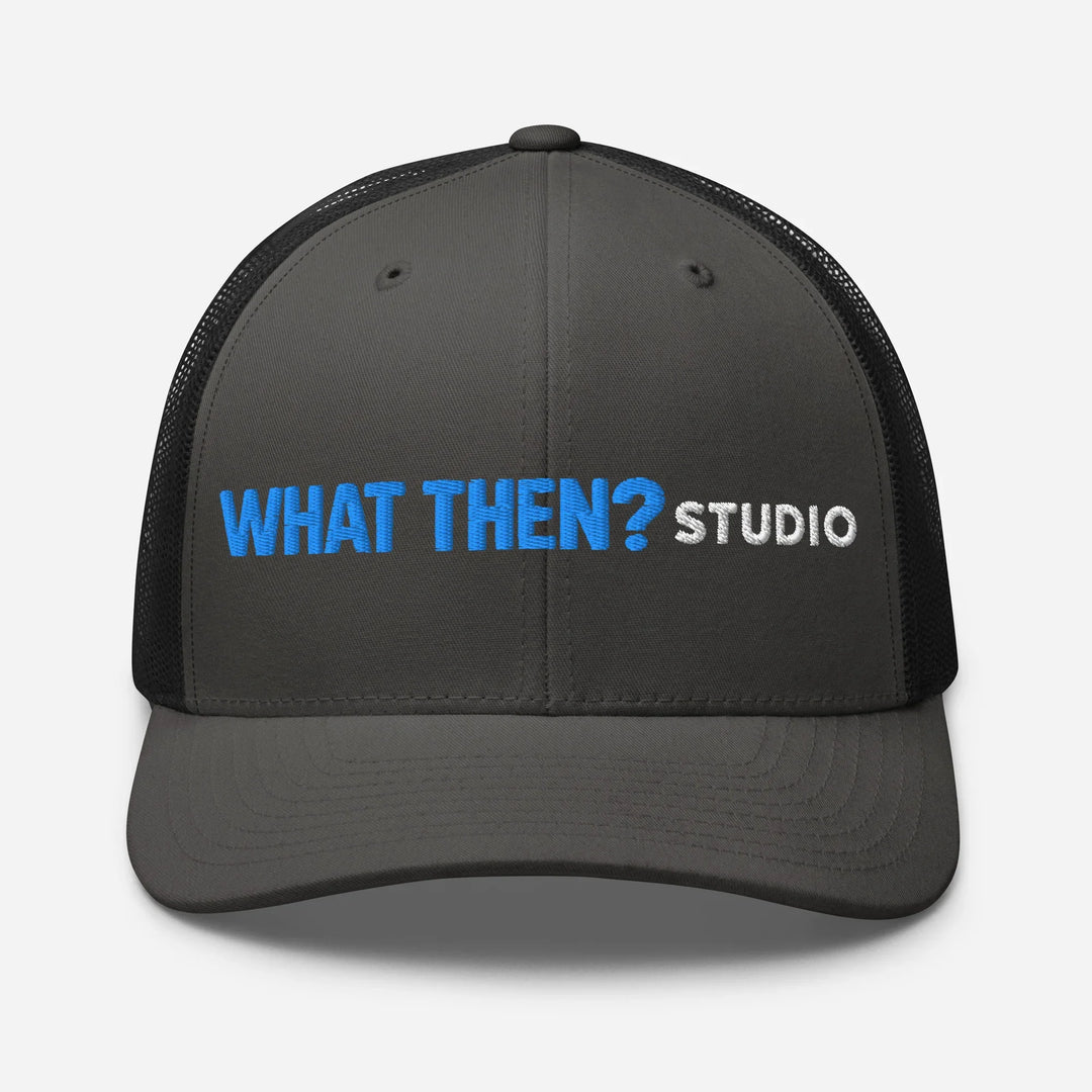 Charcoal black retro trucker hat with 'What Then? Studio' embroidered on front