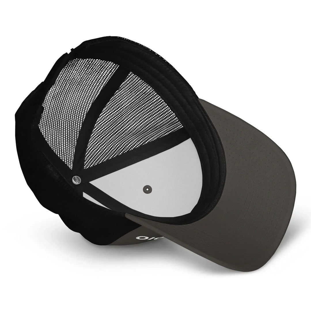 Charcoal and black retro trucker hat with mesh back and curved brim, What Then Studio