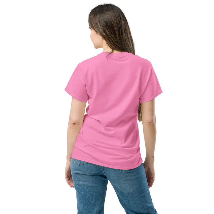 Woman wearing pink unisex classic tee and blue jeans, back view, What Then Studio apparel