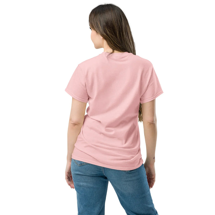 Back view of a woman wearing a light pink unisex classic tee and blue jeans