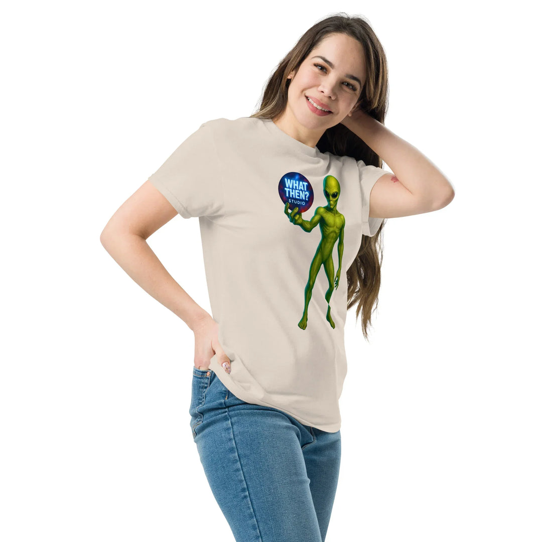Smiling woman in natural unisex t-shirt with green alien and 'What Then? Studio' logo