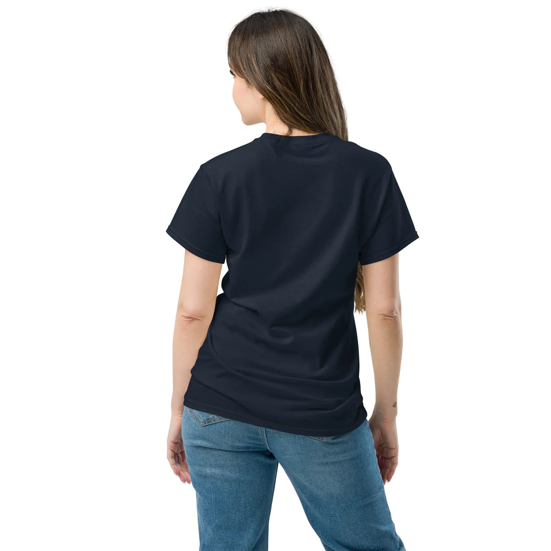 Woman wearing navy unisex classic tee and jeans, back view, What Then Studio apparel