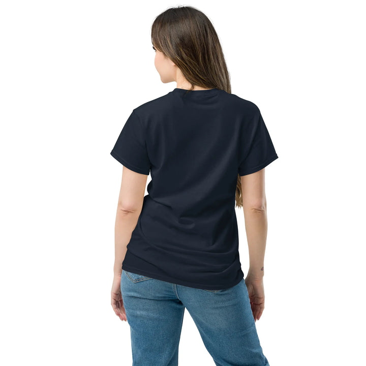Woman wearing navy unisex classic tee and jeans, back view, What Then Studio apparel