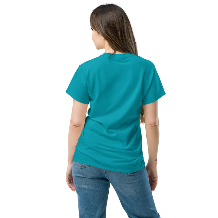Woman wearing a tropical blue unisex classic t-shirt, back view, What Then Studio apparel