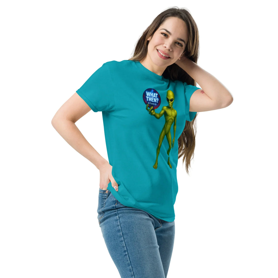 Woman wearing a tropical blue What Then Studio unisex tee with green alien graphic print