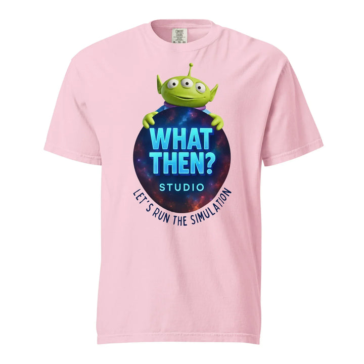 Pink heavyweight t-shirt with "What Then? Studio" logo, cartoon alien, and cosmic graphic.
