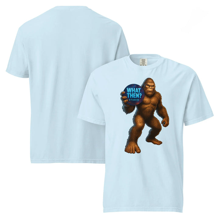 Unisex chambray heavyweight t-shirt featuring Bigfoot holding 'What Then? Studio' logo
